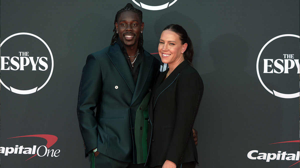 Jrue Holiday and Lauren Holiday arrive on the red carpet before the 2023 ESPYS at the Dolby Theatre. 