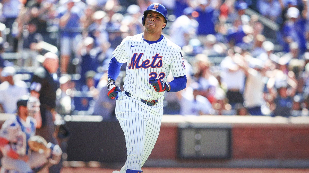New York Mets right fielder Juan Soto (22) hits a two run home run in the first inning against the New York Yankees at Citi Field.