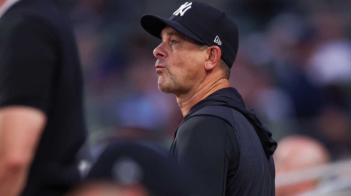 Jul 19, 2025; Atlanta, Georgia, USA; New York Yankees manager Aaron Boone (17) in the dugout against the Atlanta Braves in the fifth inning at Truist Park. Mandatory Credit: Brett Davis-Imagn Images