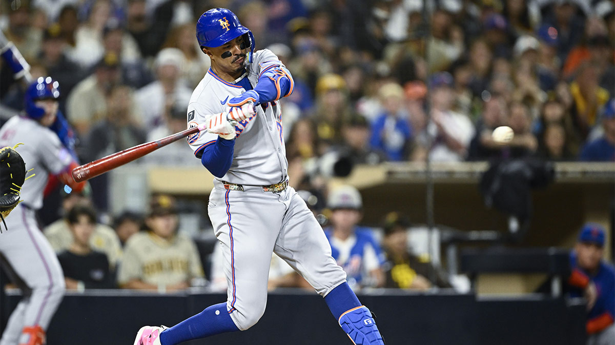 New York Mets third baseman Mark Vientos (27) hits a grand slam during the fifth inning against the San Diego Padres at Petco Park. Mandatory Credit: Denis Poroy-Imagn Images