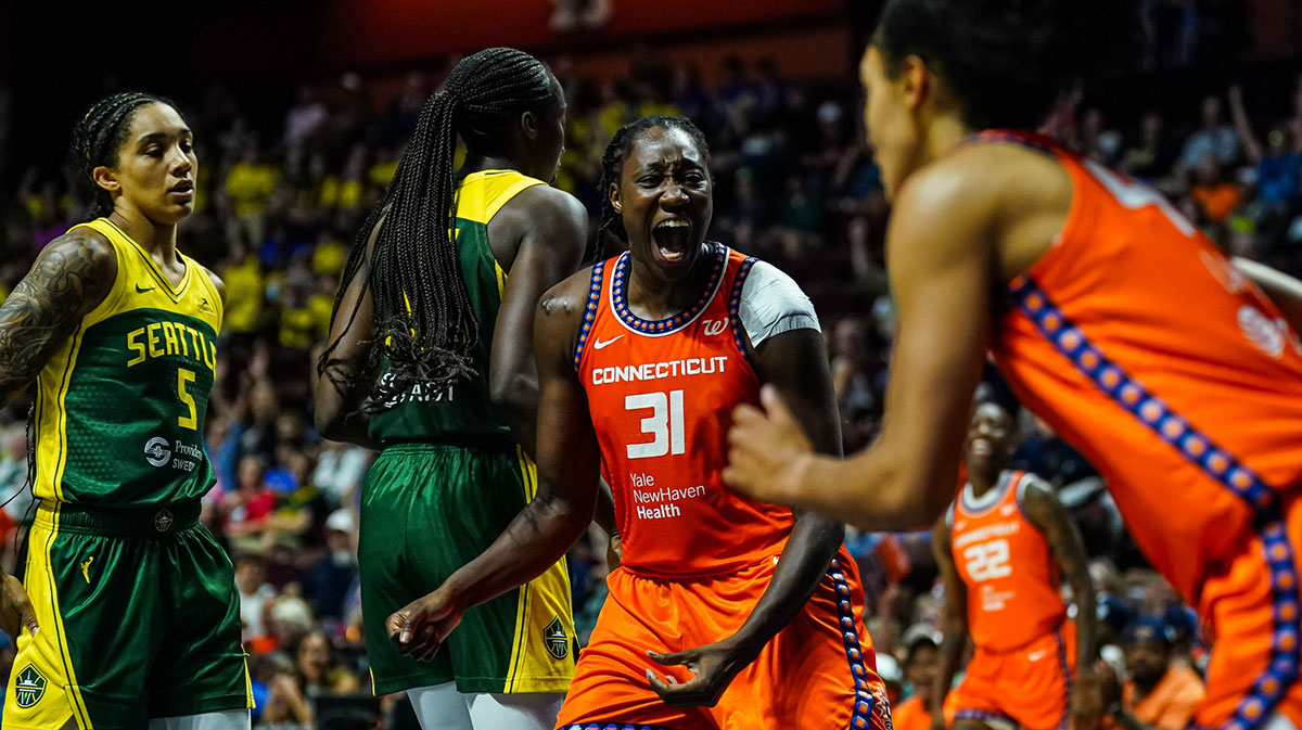 Connecticut Sun center Tina Charles (31) reacts after a basket by guard Leila Lacan (47) against the Seattle Storm in the second half at Mohegan Sun Arena.