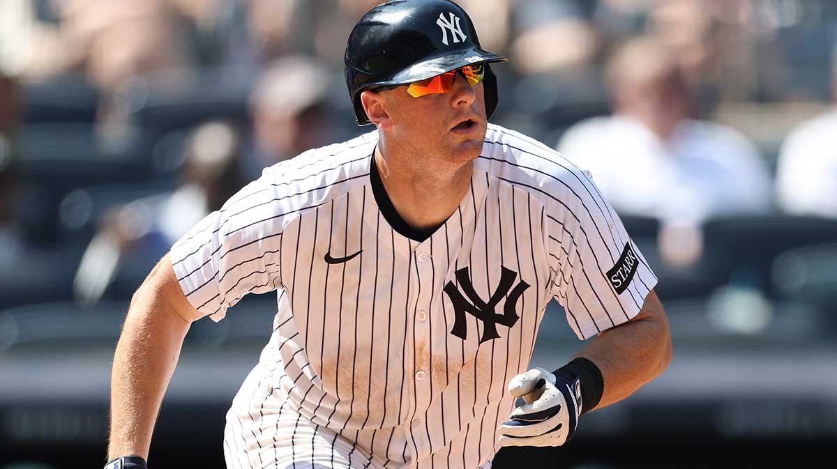 New York Yankees second base DJ LeMahieu (26) singles during the eighth inning against the Athletics at Yankee Stadium. Mandatory Credit: Vincent Carchietta-Imagn Images