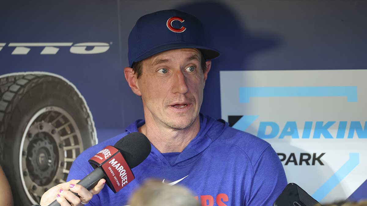 Chicago Cubs manager Craig Counsell (11) is interviewed in the dugout before the game against the Houston Astros at Daikin Park. Mandatory Credit: Troy Taormina-Imagn Images