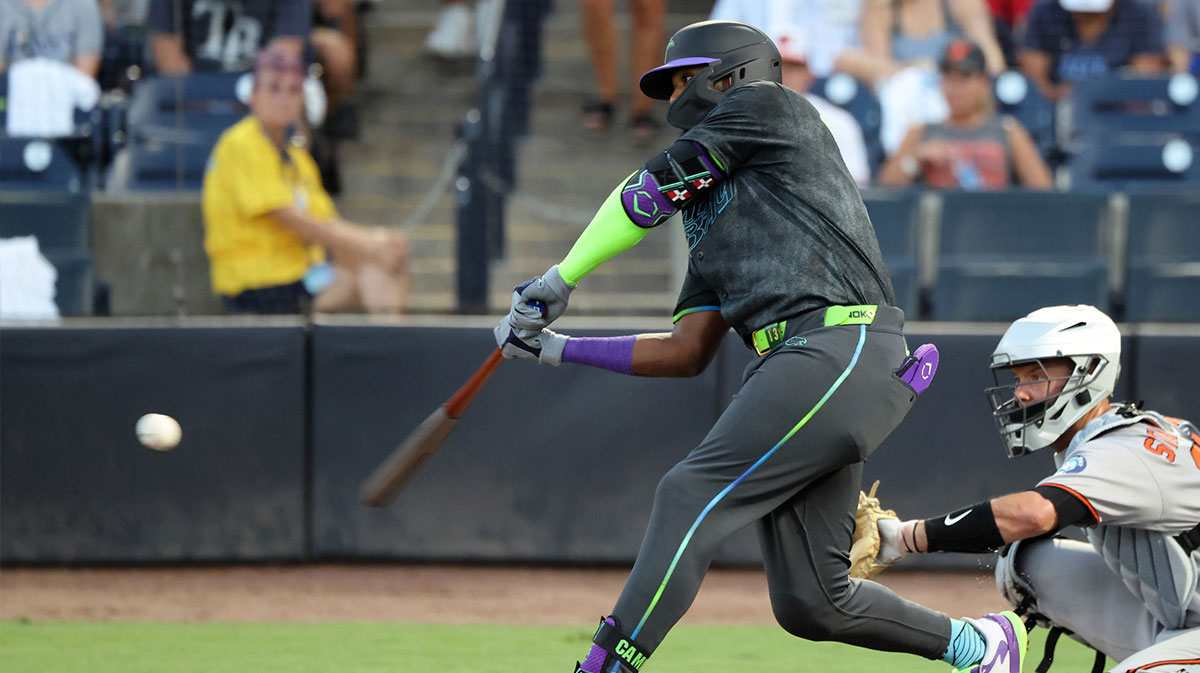 Tampa Bay Rays third base Junior Caminero (13) singles during the third inning against the Baltimore Orioles at George M. Steinbrenner Field.