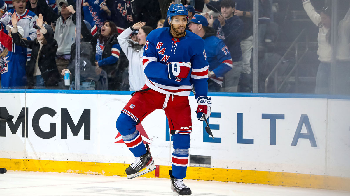 New York Rangers defenseman K'Andre Miller (79) celebrates his goal against the Vancouver Canucks during the third period at Madison Square Garden