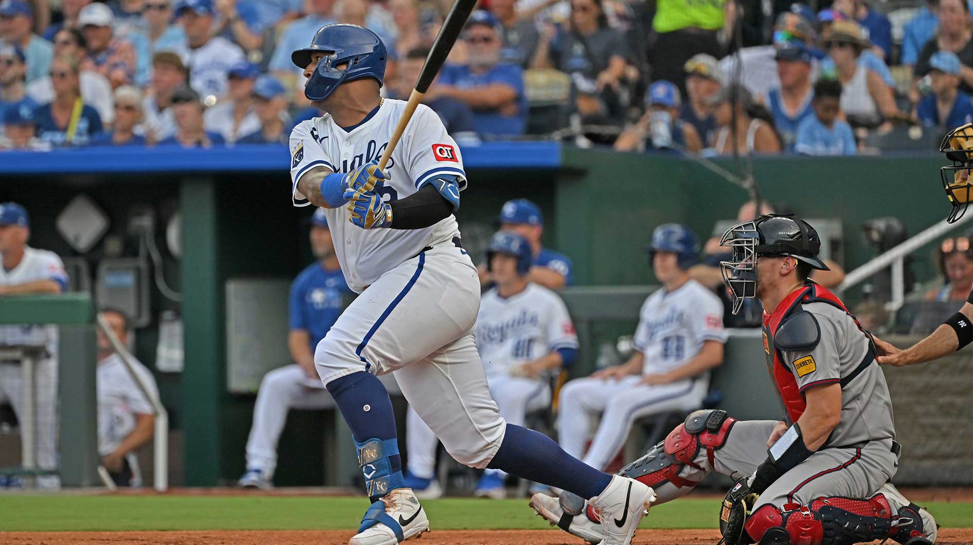 Kansas City Royals catcher Salvador Perez (13) singles in a run in the first inning against the Atlanta Braves at Kauffman Stadium.