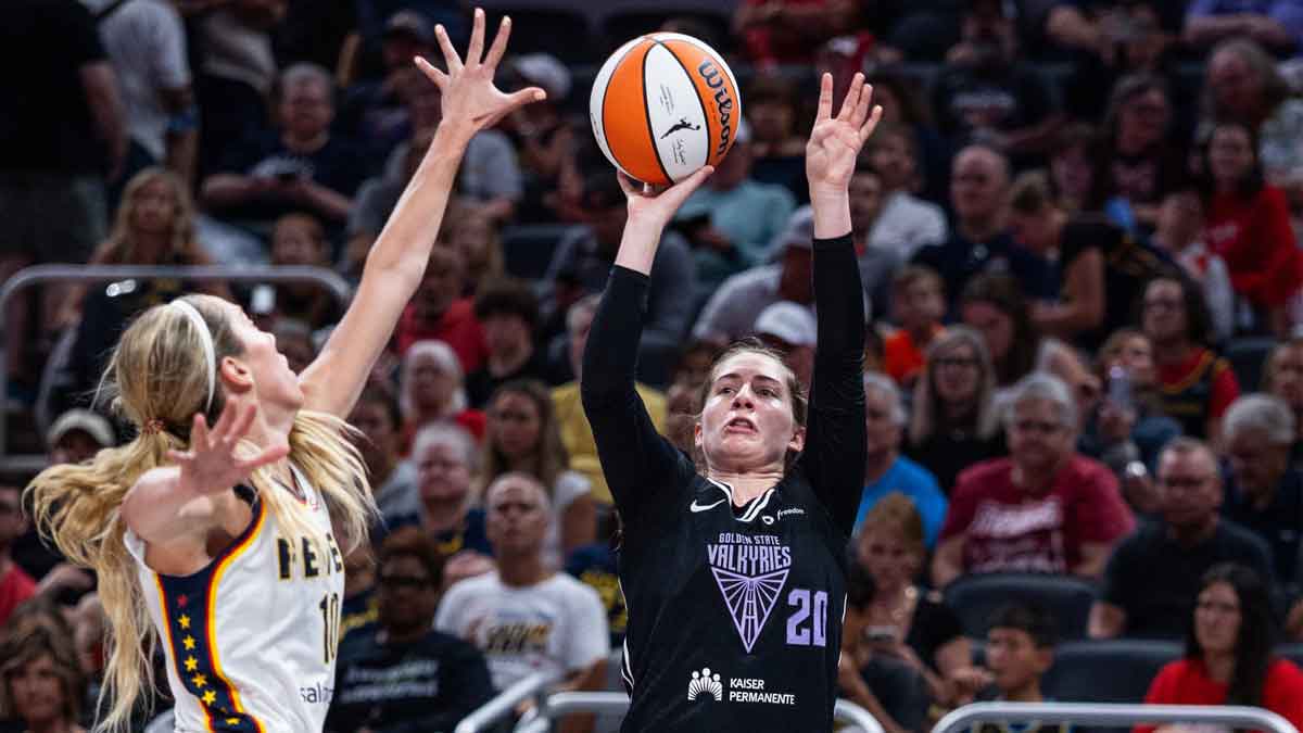 Golden State Valkyries guard Kate Martin (20) shoots the ball while Indiana Fever guard Lexie Hull (10) defends in the second half at Gainbridge Fieldhouse.