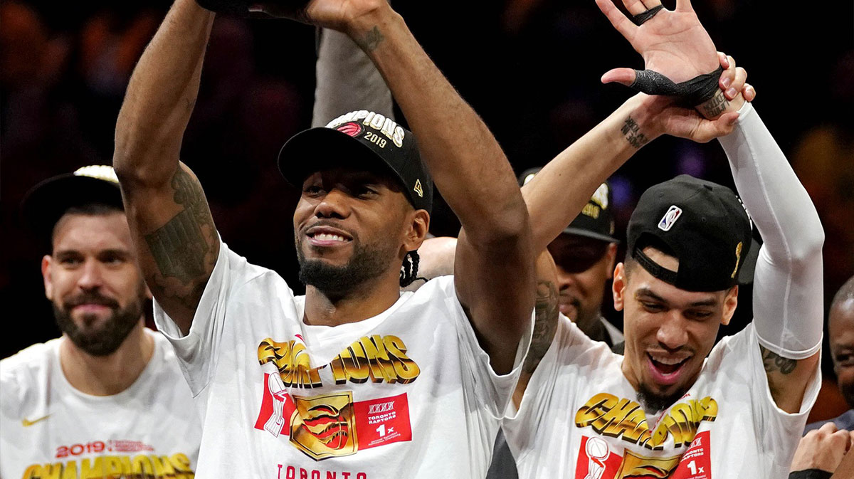 Toronto Raptors striker Kawhi Leonard (2) celebrates the MVP victory of the NBA final Bill Russell after defeating the Golden State Warriors to win the NBA championship in the sixth game of the 2019 NBA final in Oracle Arena.