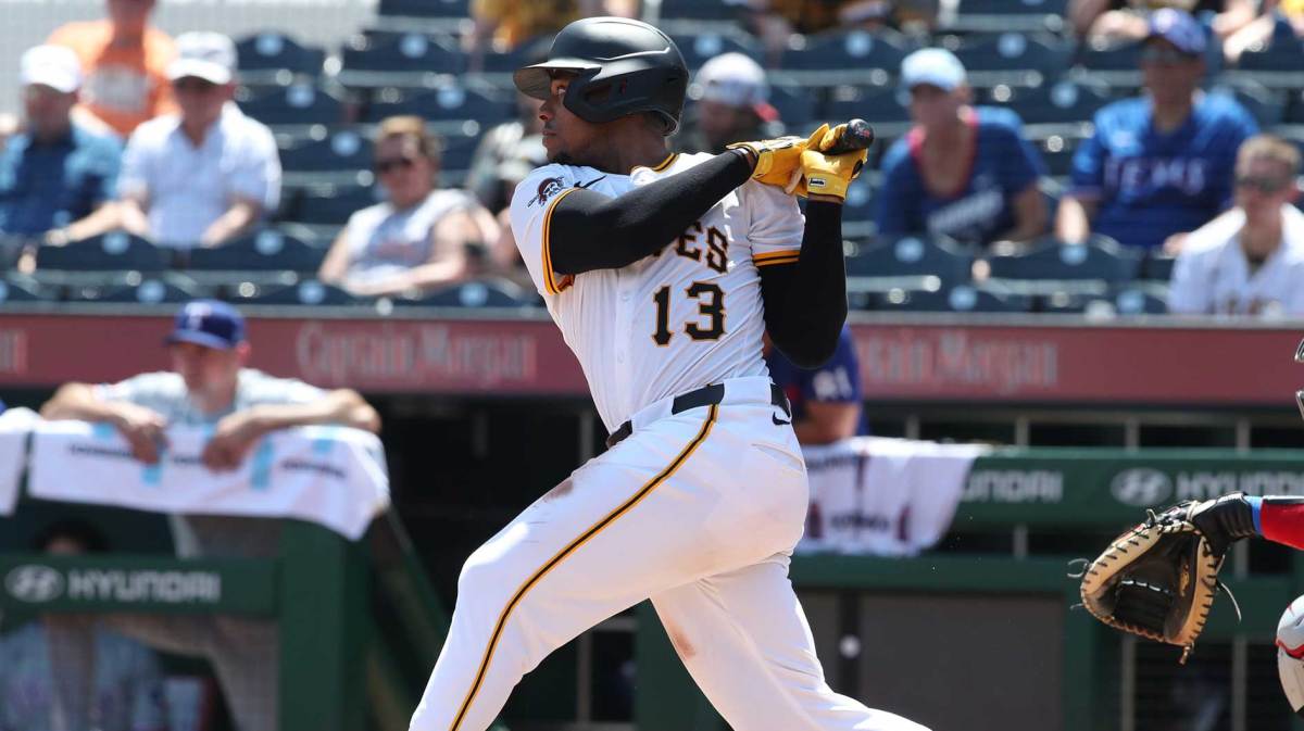 Pittsburgh Pirates third baseman Ke'Bryan Hayes (13) hits an RBI single against the Texas Rangers during the fourth inning at PNC Park.