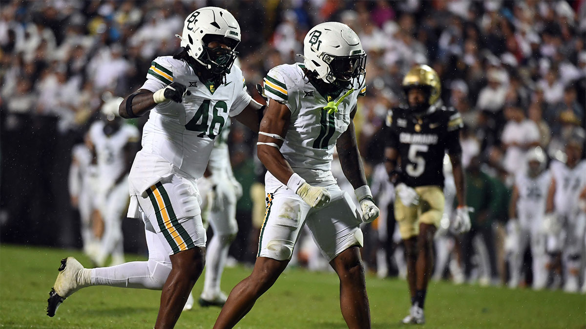 Baylor Bears linebacker Keaton Thomas (11) celebrates after a sack during the second half against the Colorado Buffaloes at Folsom Field.