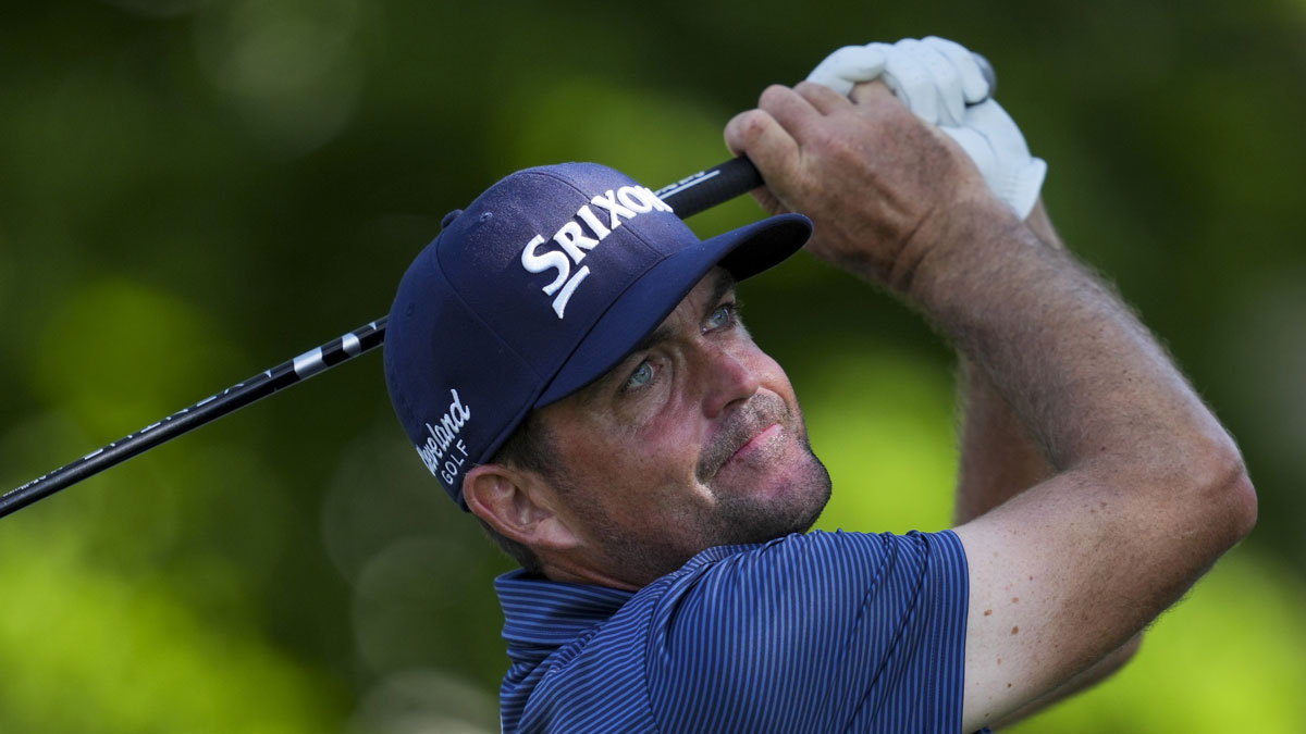 Keegan Bradley plays his shot from the 12th tee during the third round of the Rocket Mortgage Classic golf tournament.