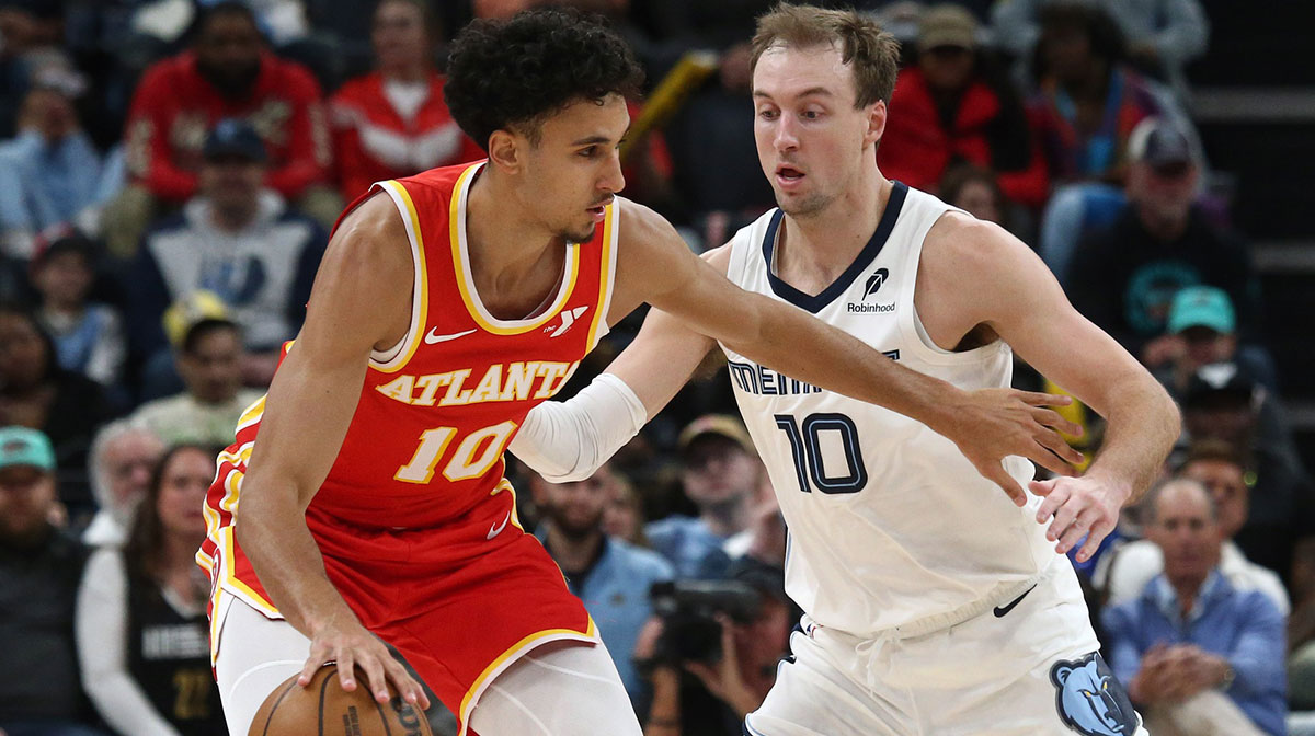 Atlanta Hawks forward Zaccharie Risacher (10) dribbles as Memphis Grizzlies guard Luke Kennard (10) defends during the fourth quarter at FedExForum.