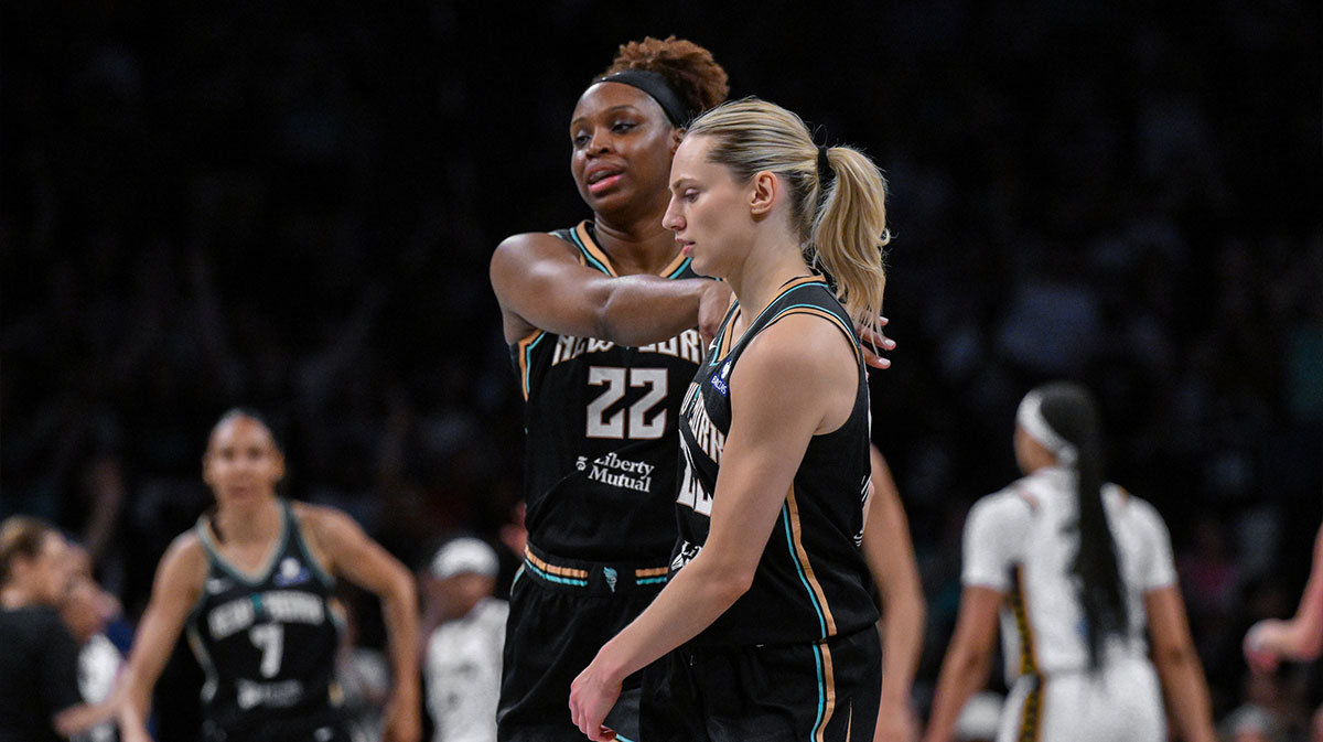 York Liberty forward Kennedy Burke (22) reacts to a three point basket by guard Marine Johannes (23) during the second half against the Indiana Fever at Barclays Center.