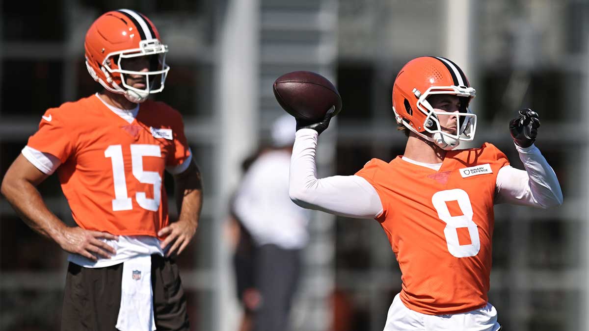 Cleveland Browns quarterback Kenny Pickett (8) throws a pass as quarterback Joe Flacco (15) looks on during training camp at CrossCountry Mortgage Campus.