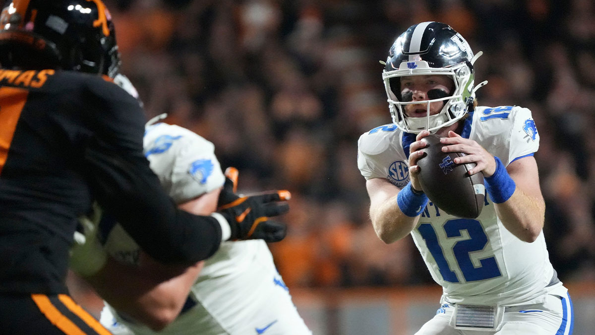 Kentucky quarterback Brock Vandagriff (12) takes the snap against the Tennessee Volunteers at Neyland Stadium in Knoxville, Tenn., on Nov 2, 2024.