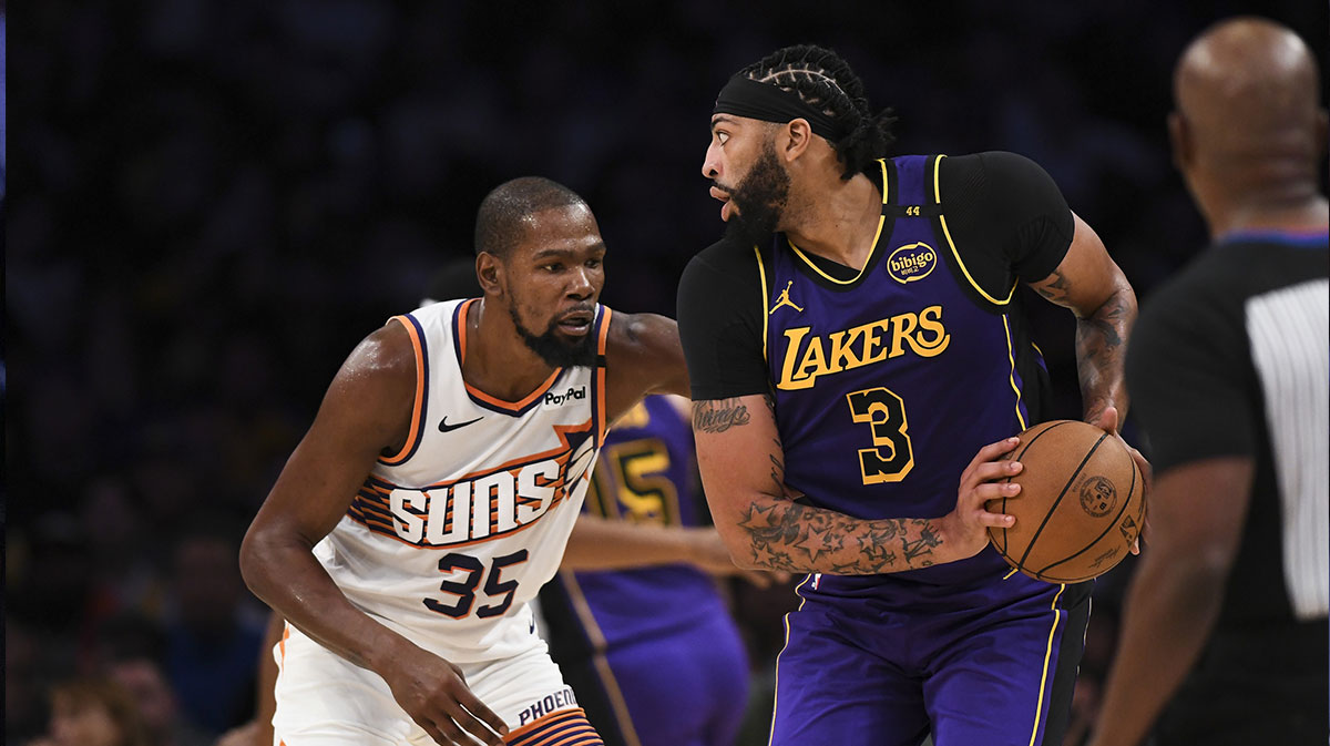 Los Angeles Lakers forward Anthony Davis (3) looks to pass against Phoenix Suns forward Kevin Durant (35) during the second half at Crypto.com Arena.