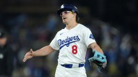 Los Angeles Dodgers first baseman Kike Hernandez (8) reacts after the final out after pitching in the ninth inning against the Miami Marlins at Dodger Stadium.
