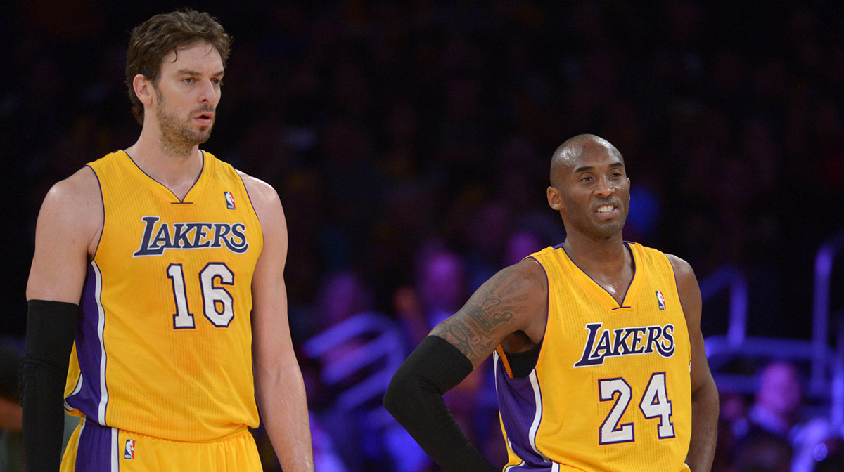 Los Angeles Lakers forward Pau Gasol (16) and guard Kobe Bryant (24) react during the game against the Phoenix Suns at Staples Center. The Suns defeated the Lakers 114-108.