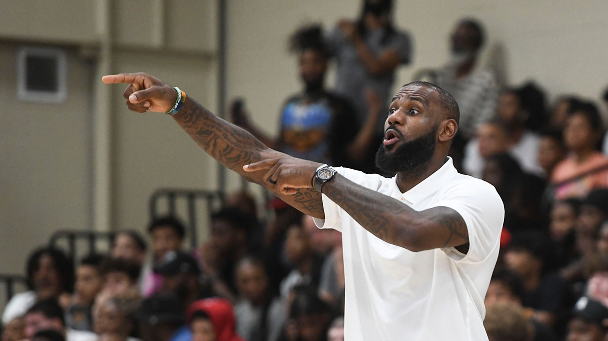 LeBron James coaches Strive for Greatness during the Strive for Greatness and Mokan Elite basketball game at the fourth day of the Nike Peach Jam at Riverview Park Activities Center