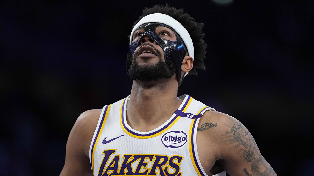 Los Angeles Lakers guard Jordan Goodwin (30) wears a protective face mask against the Phoenix Suns in the second half at Crypto.com Arena.