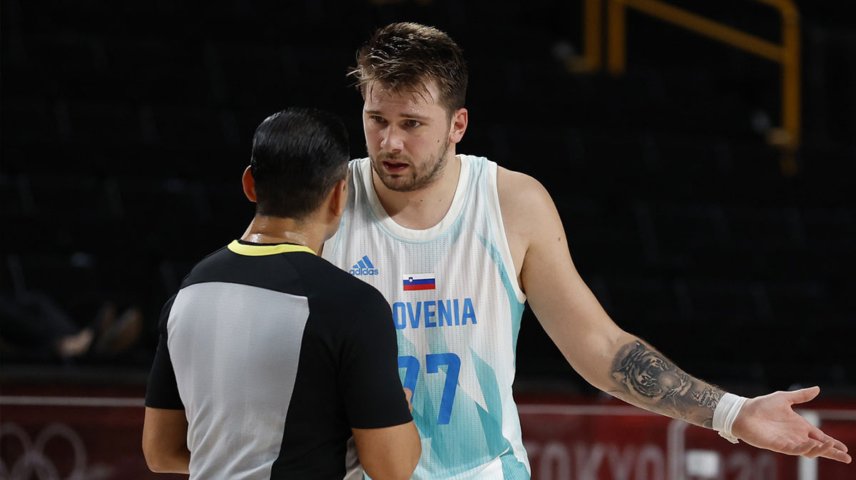 Team Slovenia point guard Luka Doncic (77) questions a call after a technical foul in the second quarter against Australia during the Tokyo 2020 Olympic Summer Games at Saitama Super Arena.