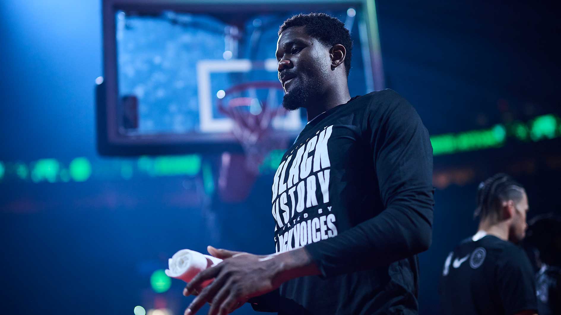Blazers center Deandre Ayton (2) walks out to the court during introductions before a game against the Sacramento Kings at Moda Center
