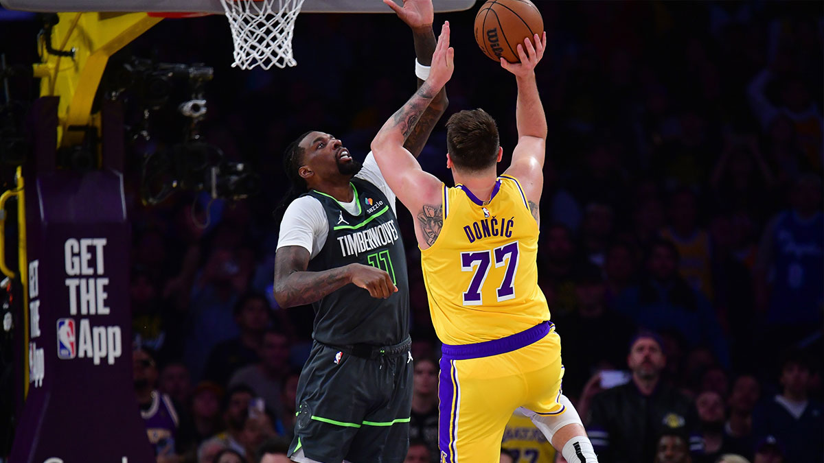 Los Angeles Lakers guard Luka Doncic (77) shoots against Minnesota Timberwolves center Naz Reid (11) during the second half in game five of first round for the 2025 NBA Playoffs at Crypto.com Arena. Lakers guard Luka Doncic was selected in the Slovenia preliminary squad for EuroBasket 2025.