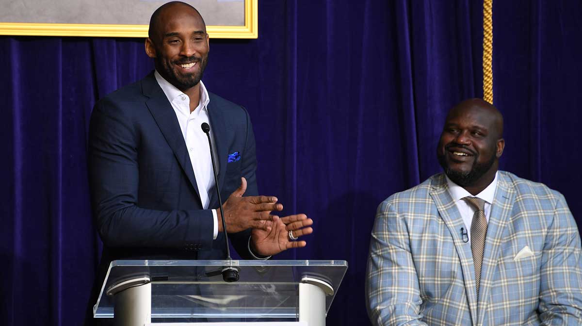 Kobe Bryant (left) speaks during ceremony to unveil statue of Los Angeles Lakers former center Shaquille O'Neal at Staples Center