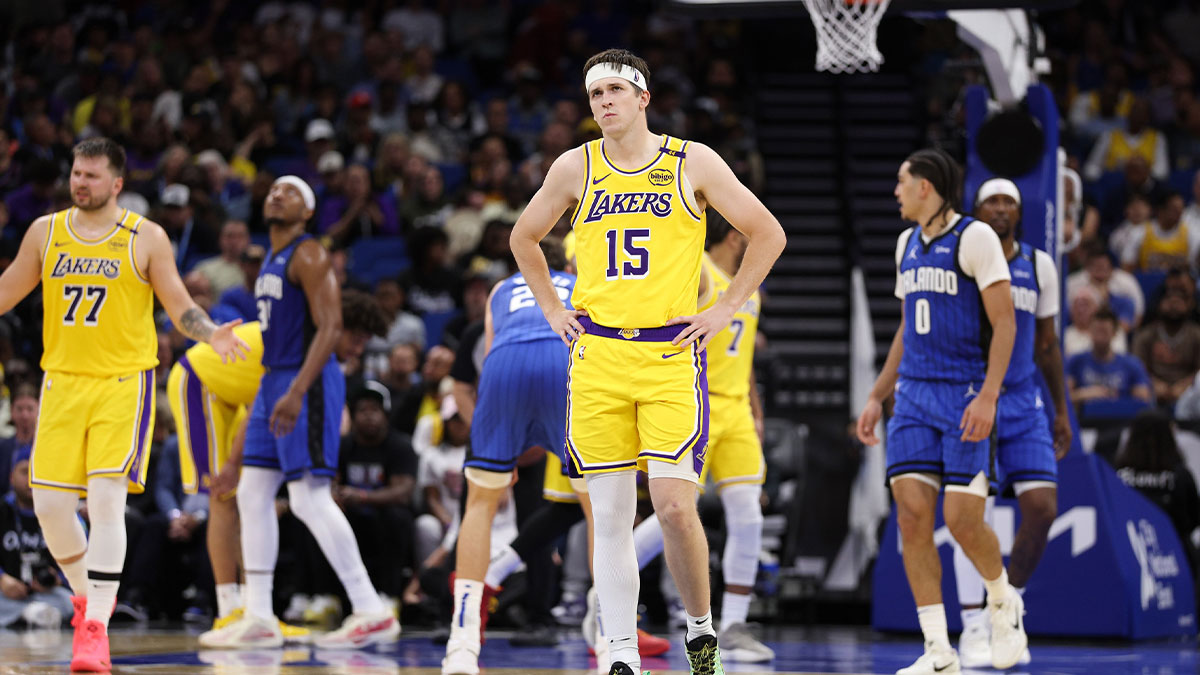 Los Angeles Lakers guard Austin Reaves (15) reacts after a play against the Orlando Magic in the second quarter at Kia Center.