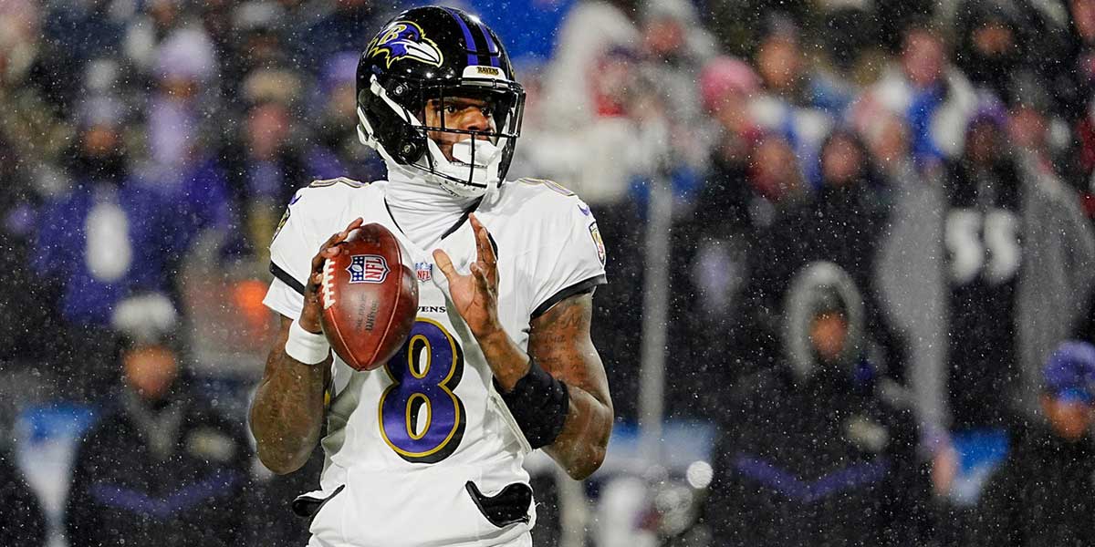 Baltimore Ravens quarterback Lamar Jackson gets ready to launch the ball during first half action at the Buffalo Bills divisional game against the Baltimore Ravens at Highmark Stadium in Orchard Park on Jan. 19, 2025.