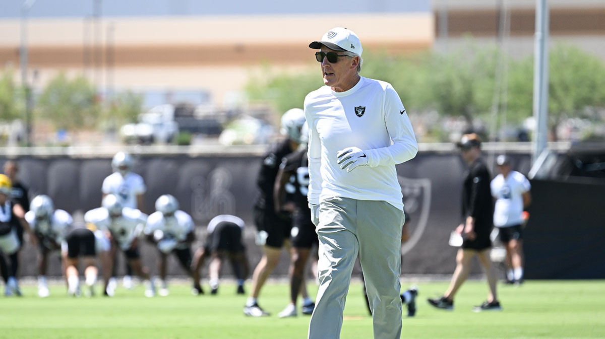Las Vegas Raiders head coach Pete Carroll runs down the field during Las Vegas Raiders Minicamp at Intermountain Health Performance Center.