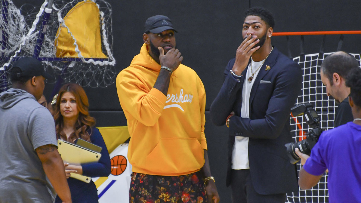 Los Angeles Laker forward LeBron James (left) and forward/center Anthony Davis (talk) after an introductory press conference for Davis at UCLA Health Training Center. Davis was traded to the Lakers from New Orleans for several players and future draft picks.