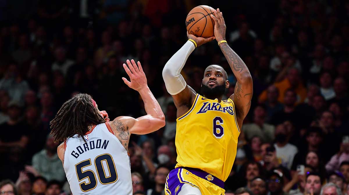 Los Angeles Lakers forward LeBron James (6) shoots the ball against Denver Nuggets forward Aaron Gordon (50) during the fourth quarter in game four of the Western Conference Finals for the 2023 NBA playoffs at Crypto.com Arena.
