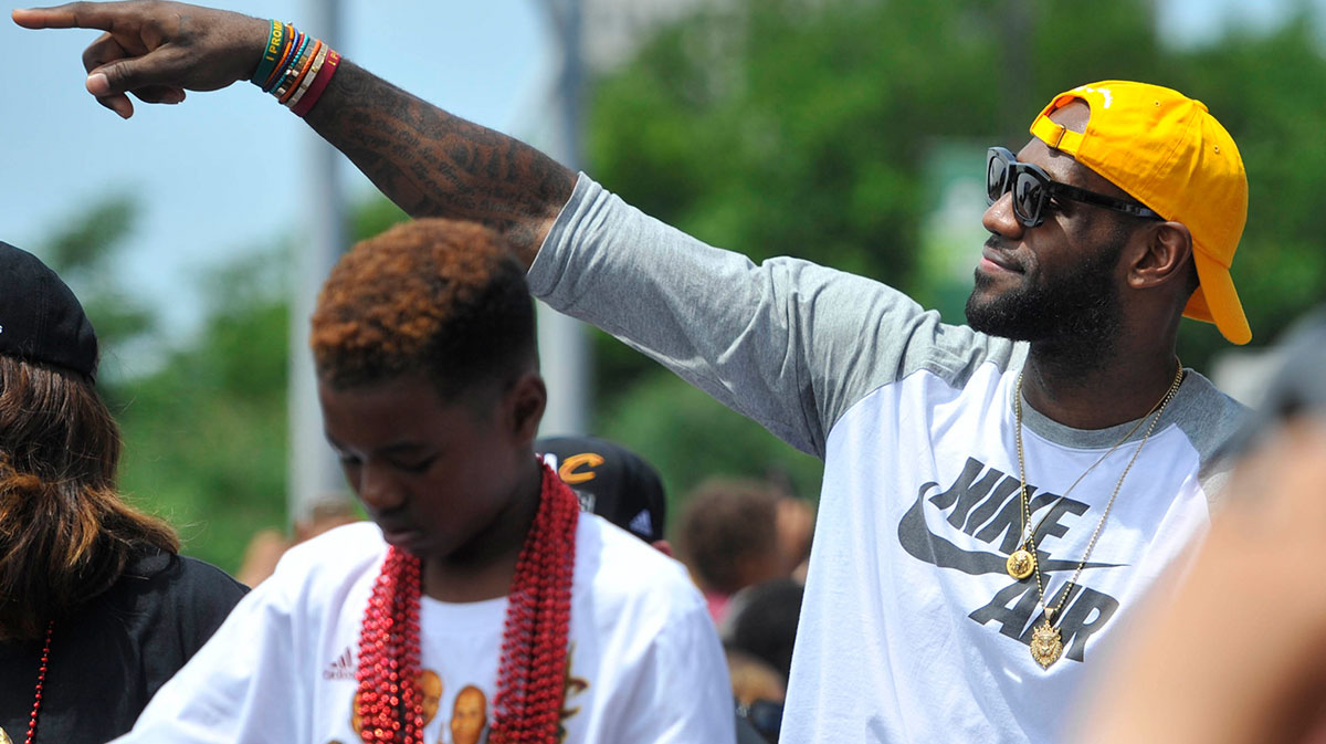 Cleveland Cavaliers forward LeBron James celebrates during the NBA championship parade in downtown Cleveland.