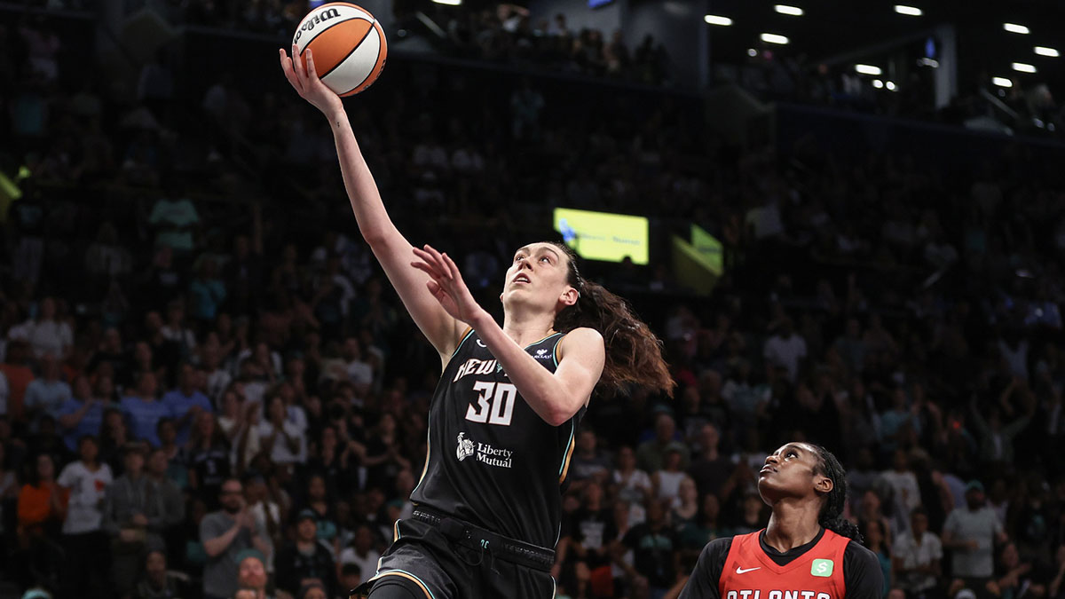 New York Liberty forward Breanna Stewart (30) drives past Atlanta Dream guard Maya Caldwell (33) for a layup in the fourth quarter at Barclays Center.