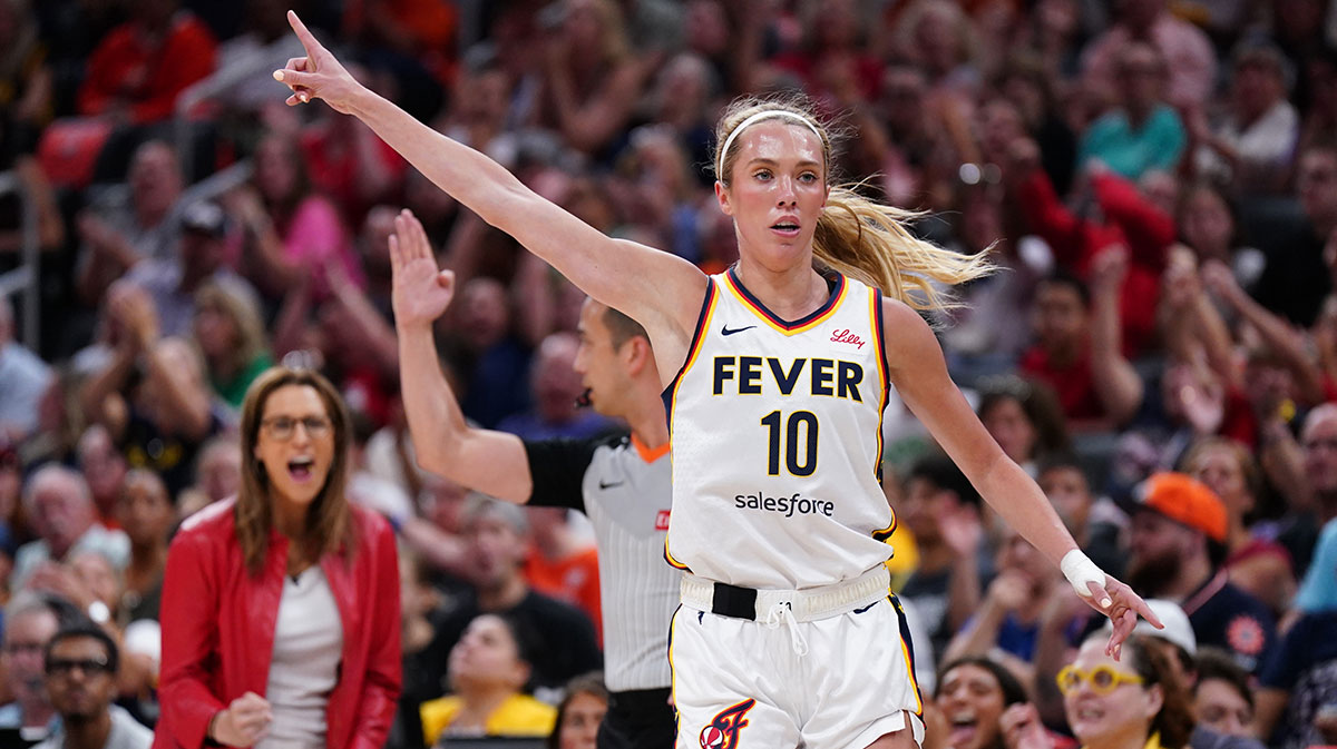 Indiana Fever guard Lexie Hull (10) reacts after her three point basket against the Connecticut Sun in the first quarter