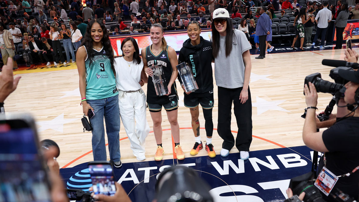 New York Liberty player Isabelle Harrison (left), owner Clara Wu Tsai, guard Sabrina Ionescu and forward Breanna Stewart pose for a photo during the 2025 WNBA All Star Skills Challenge at Gainbridge Fieldhouse.