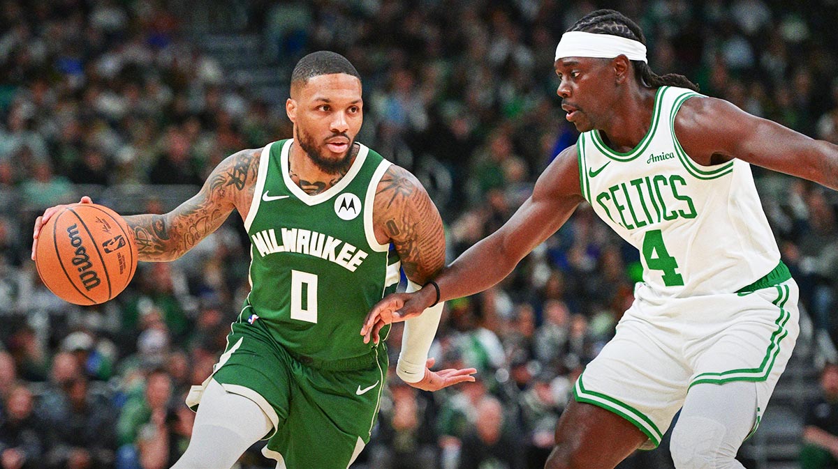Milwaukee, Wisconsin, USA; Milwaukee Bucks guard Damian Lillard (0) drives for the basket against Boston Celtics guard Jrue Holiday (4) in the first quarter at Fiserv Forum. Mandatory Credit: Benny Sieu-Imagn Images