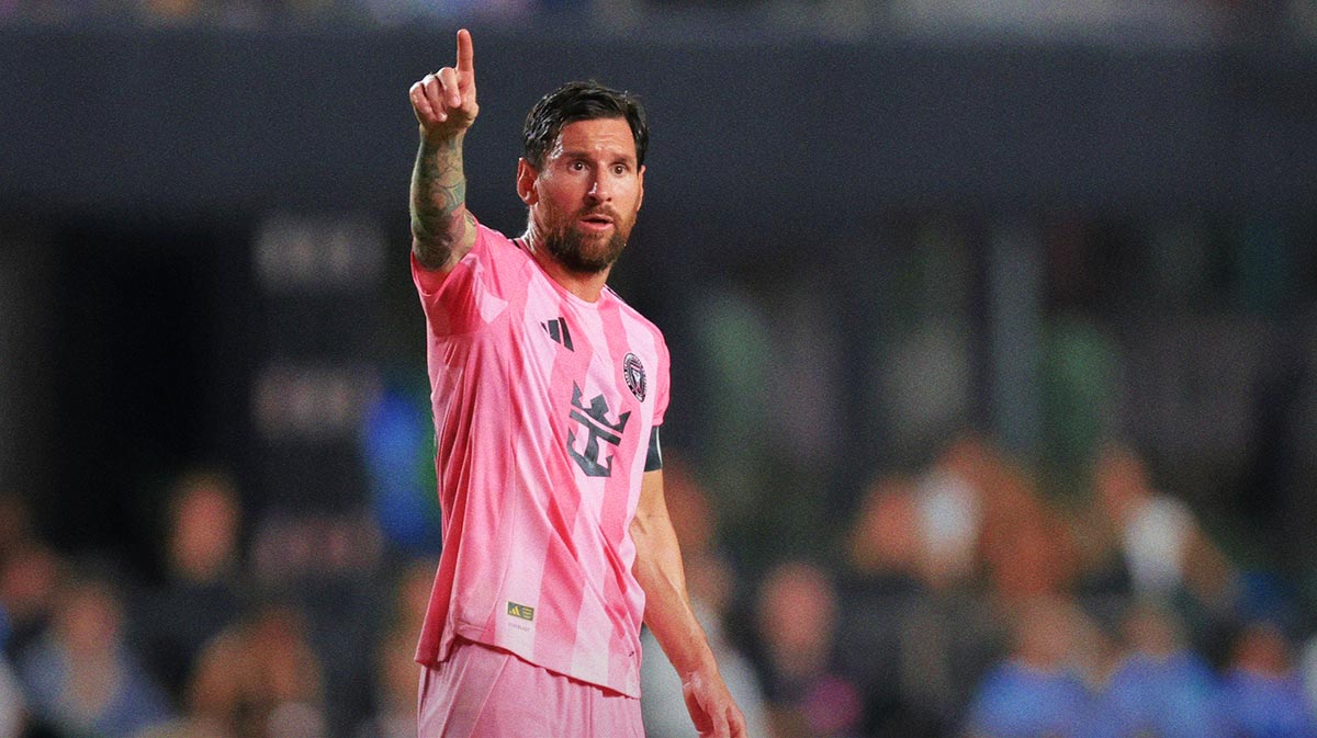 Inter Miami CF forward Lionel Messi (10) signals against Nashville SC during the second half at Chase Stadium.