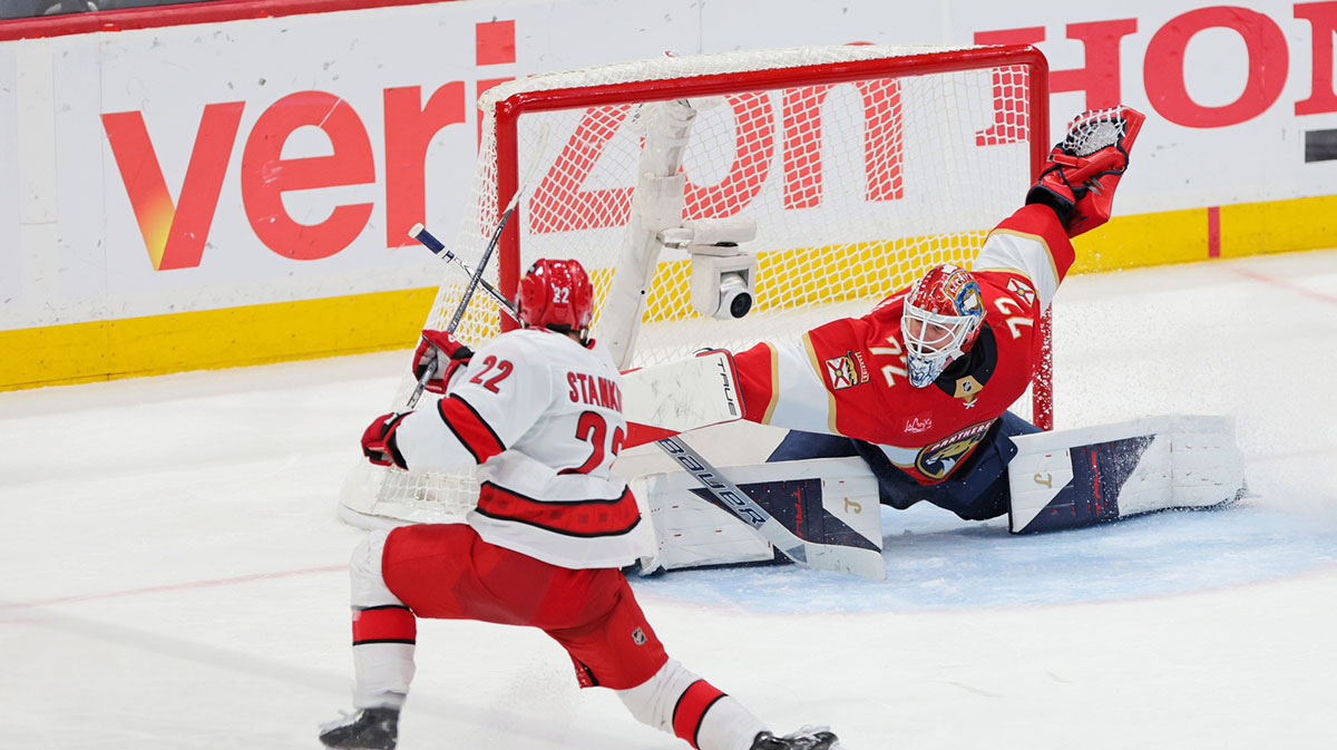 Carolina Hurricanes center Logan Stankoven (22) takes a shot on goal as Florida Panthers goaltender Sergei Bobrovsky (72) makes a save during the second period in game three of the Eastern Conference Final of the 2025 Stanley Cup Playoffs at Amerant Bank Arena.