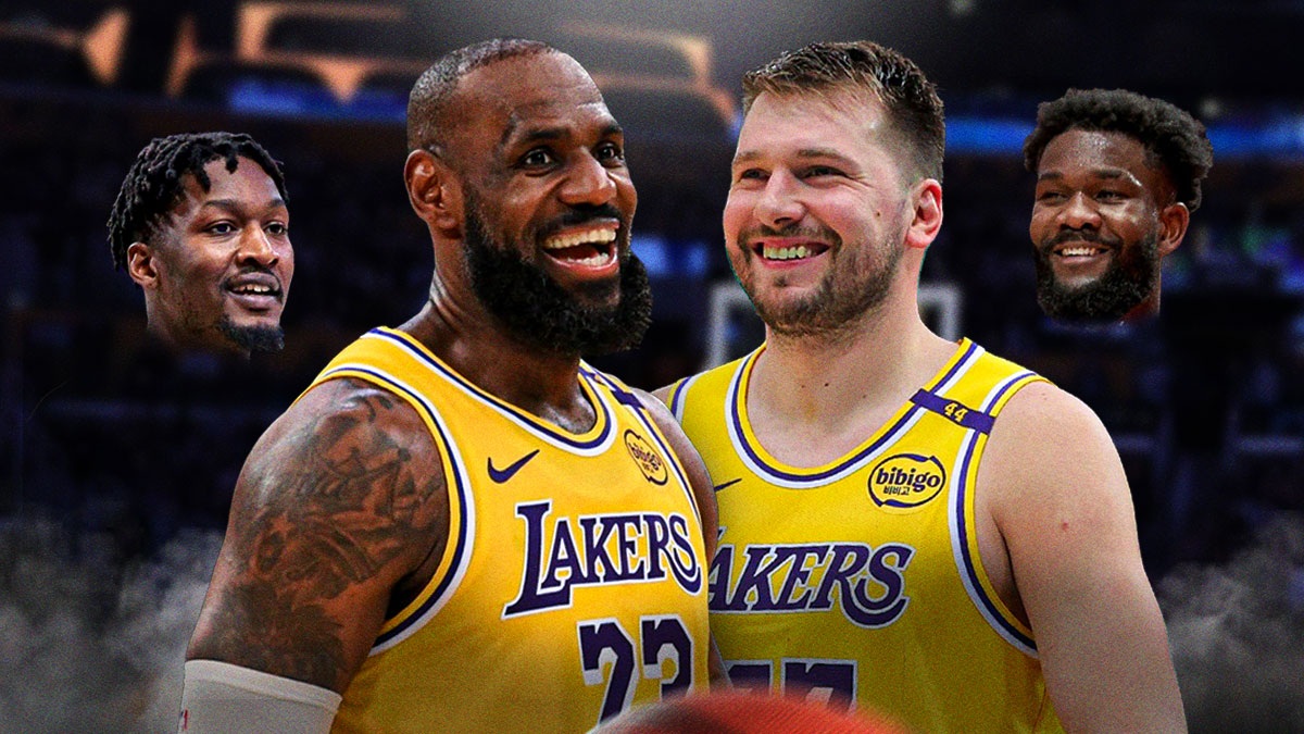 Lakers' LeBron James and Luka Doncic in the middle, with head cutouts of Dorian Finney-Smith and Deandre Ayton beside them
