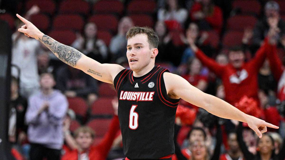 Louisville Cardinals guard Reyne Smith (6) reacts during the second half against the Winthrop Eagles at KFC Yum! Center. Louisville defeated Winthrop 76-61.