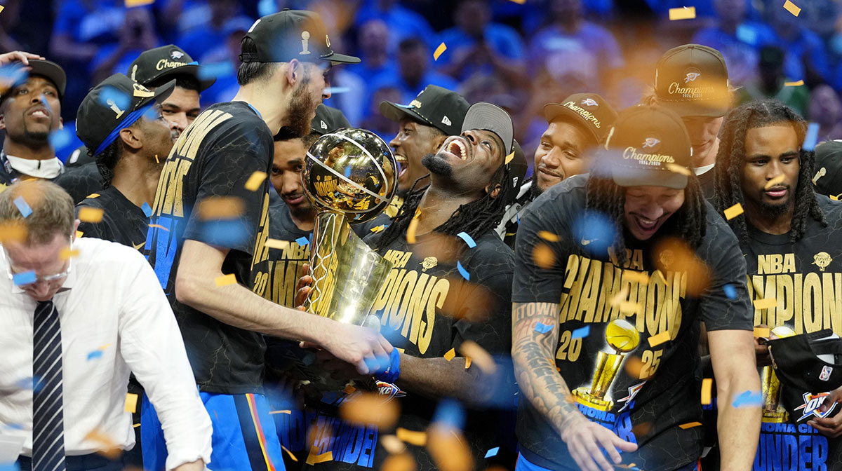 Oklahoma City Thunder guard Luguentz Dort (5) celebrates after winning game seven of the 2025 NBA Finals against the Indiana Pacers at Paycom Center.