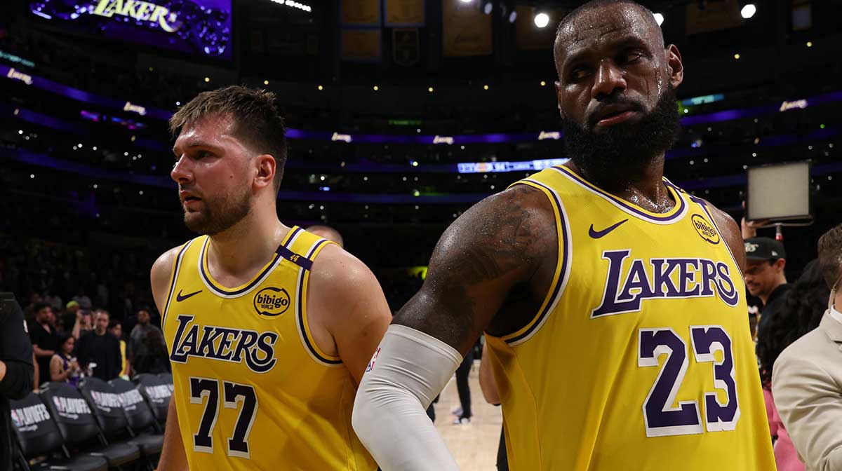 Los Angeles Lakers guard Luka Doncic (77) and Los Angeles Lakers forward LeBron James (23) leave a court after defeating the Minnesota Timberwolves 94-85 in game two of first round for the 2024 NBA Playoffs at Crypto.com Arena.