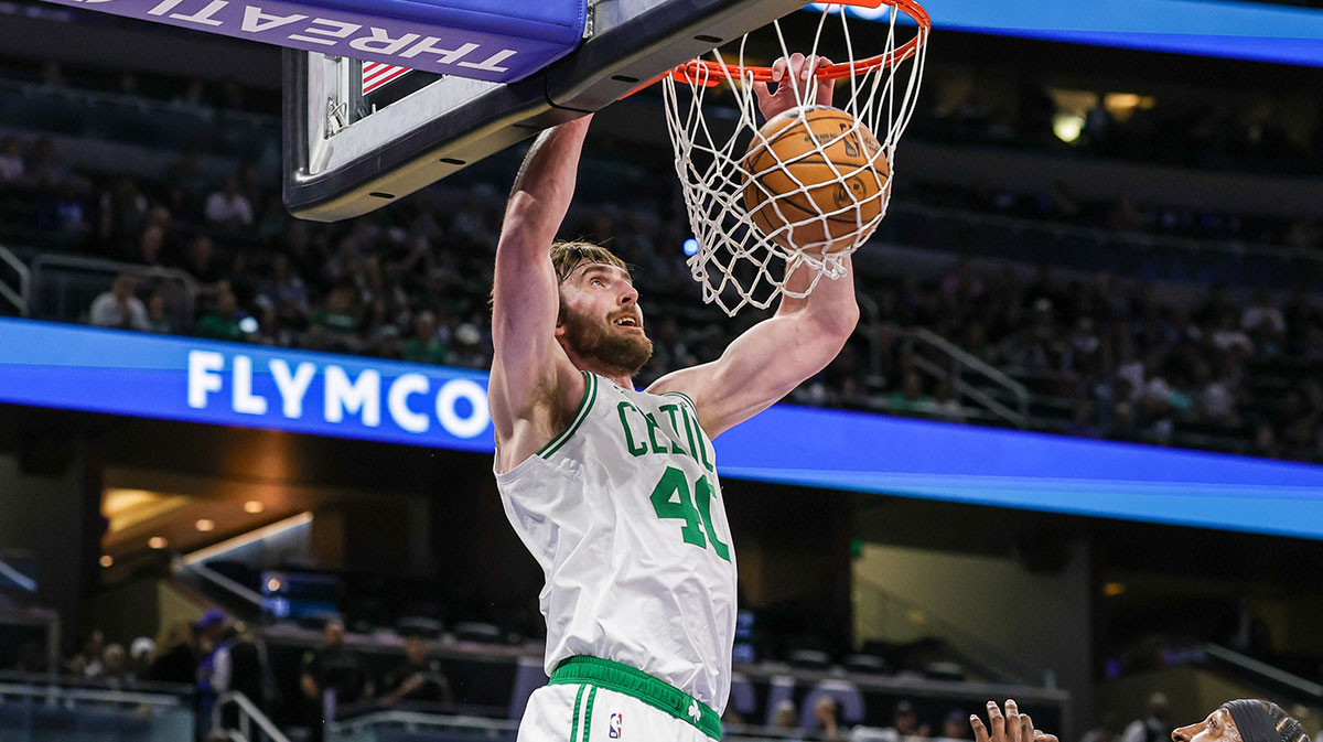 Boston Celtics center Luke Kornet (40) dunks during the first quarter against the Orlando Magic at Kia Center.