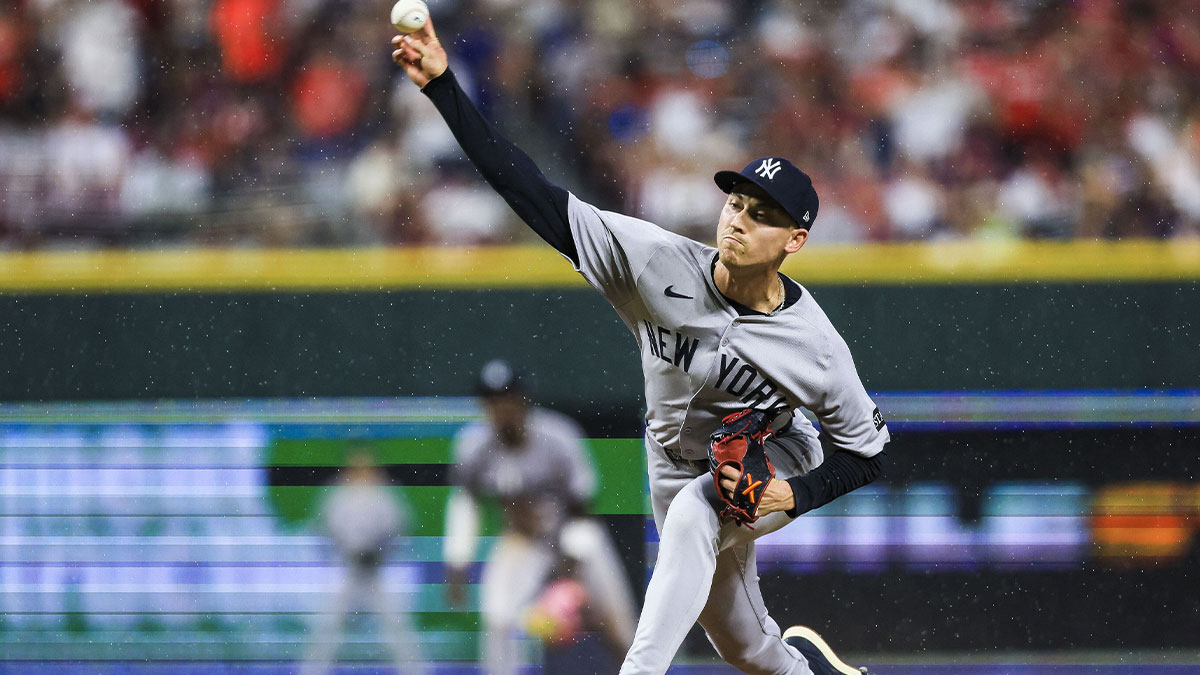 New York Yankees pitcher Luke Weaver (30) delivers a pitch during the ninth inning against the Athletics at Yankee Stadium.