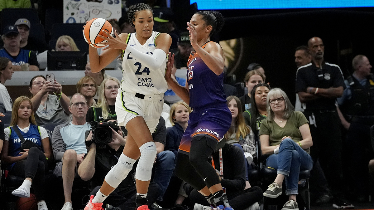 Minnesota Lynx forward Napheesa Collier (24) works around Phoenix Mercury forward Alyssa Thomas (25) in the fourth quarter at Target Center