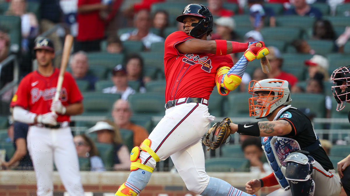 Atlanta Braves right fielder Ronald Acuna Jr. (13) hits a single against the Baltimore Orioles in the third inning at Truist Park.