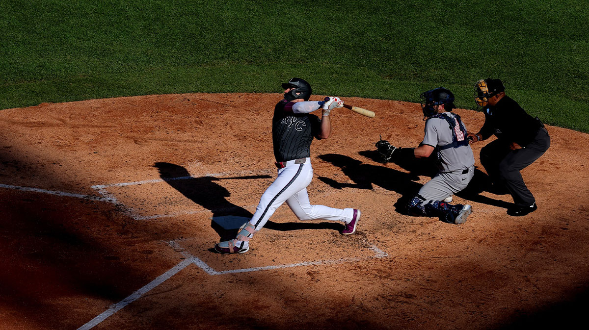 New York Mets first baseman Pete Alonso (20) follows through on a two run home run against the New York Yankees during the fifth inning at Citi Field.