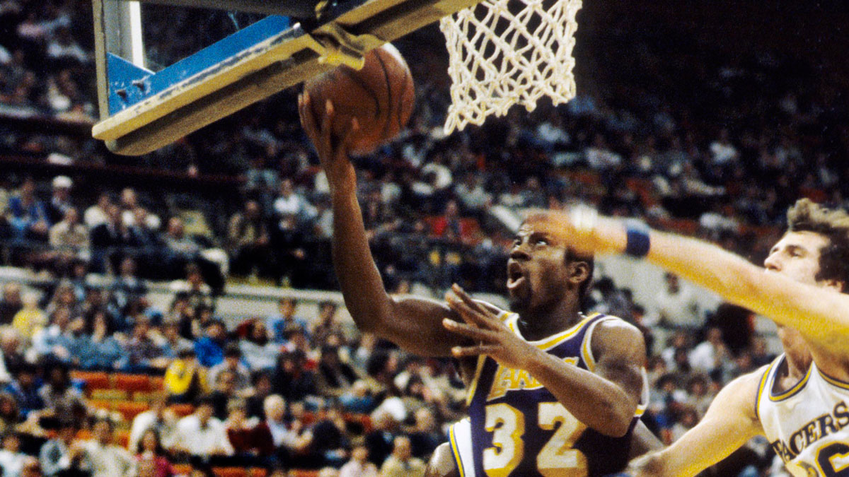Los Angeles Lakers guard Magic Johnson (32) in action against the Indiana Pacers at Market Square Arena.